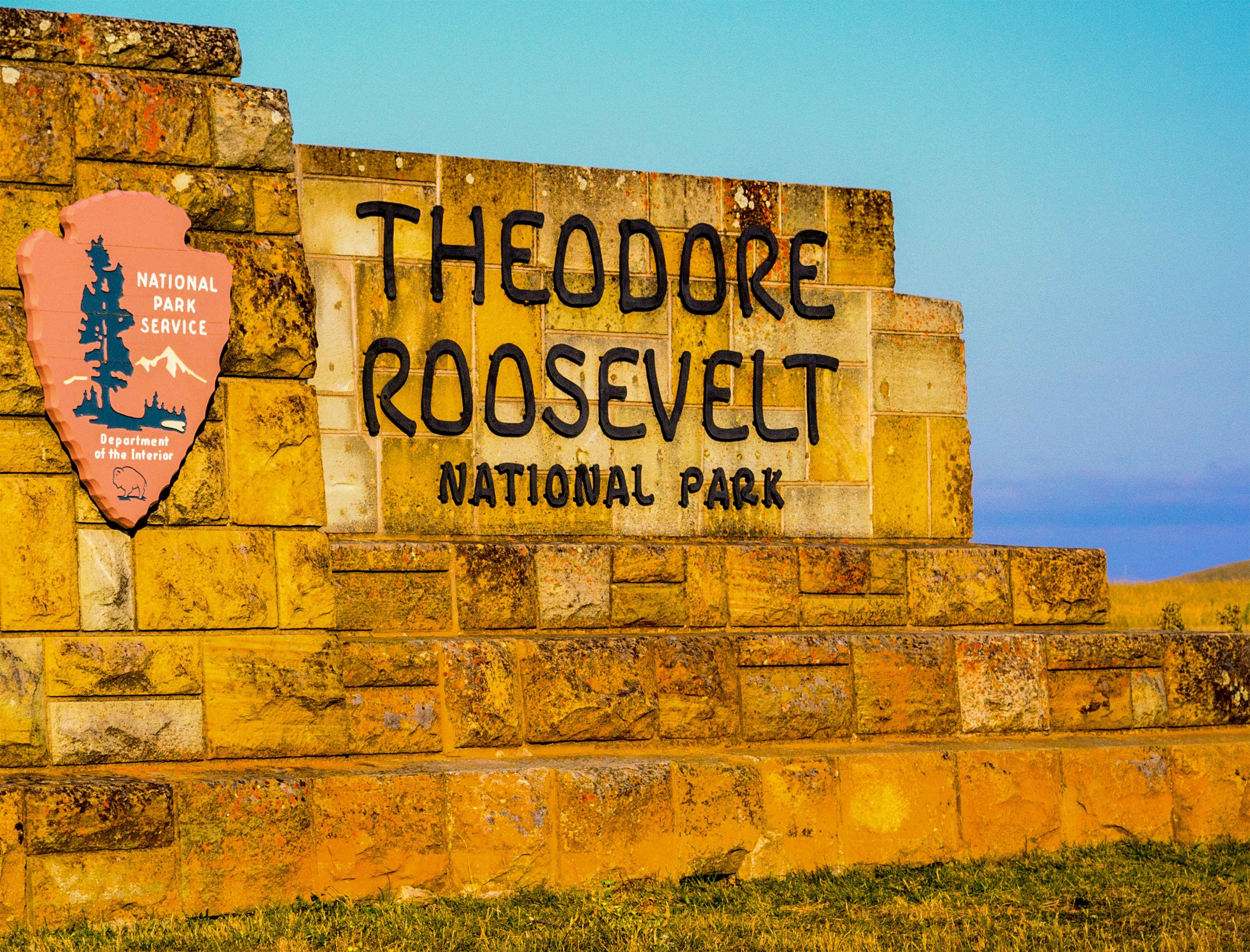 There is a sign for theodore roosevelt national park