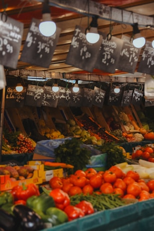 A bunch of fruits and vegetables on display at a market