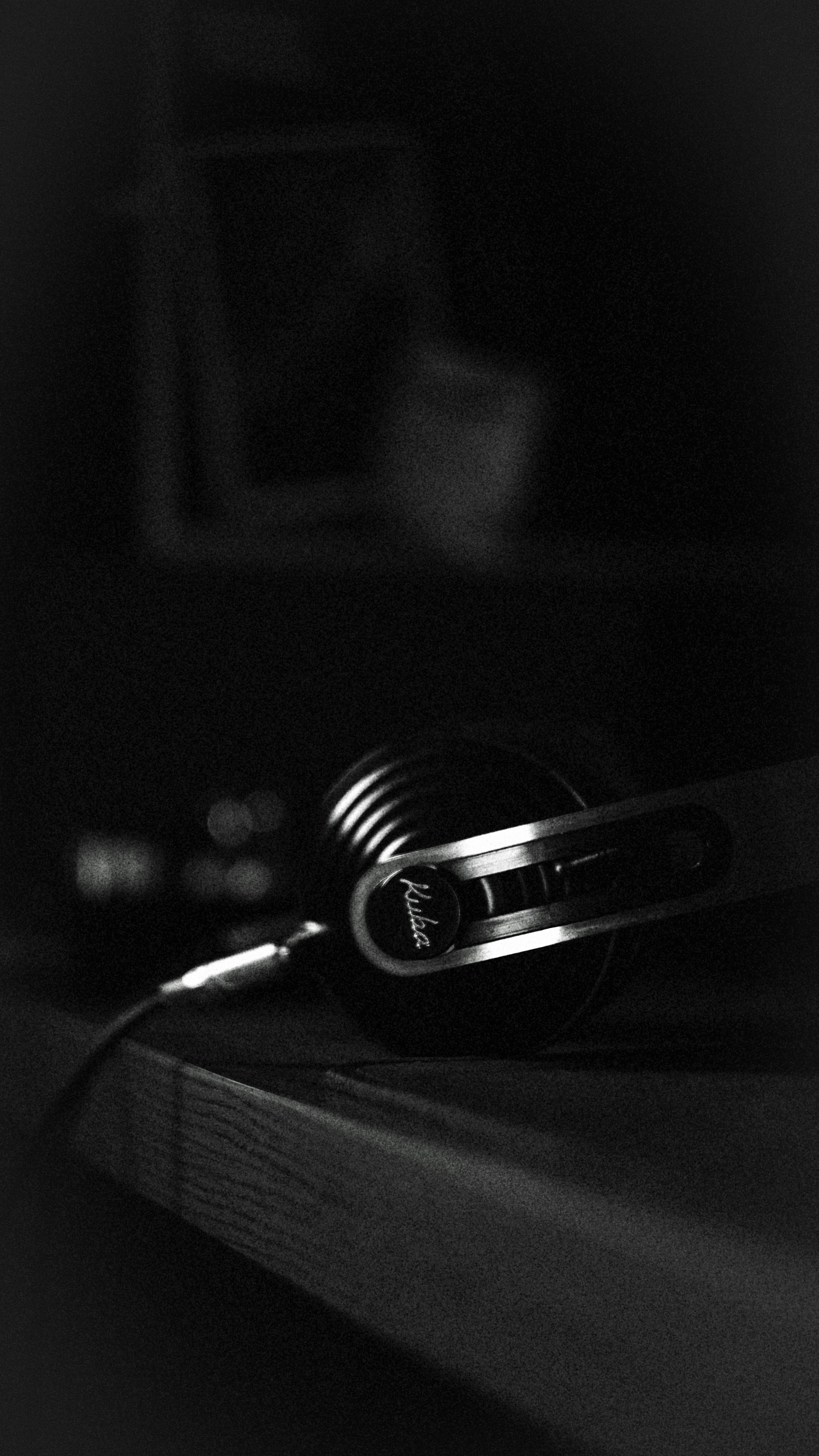 A black and white photo of a pair of scissors