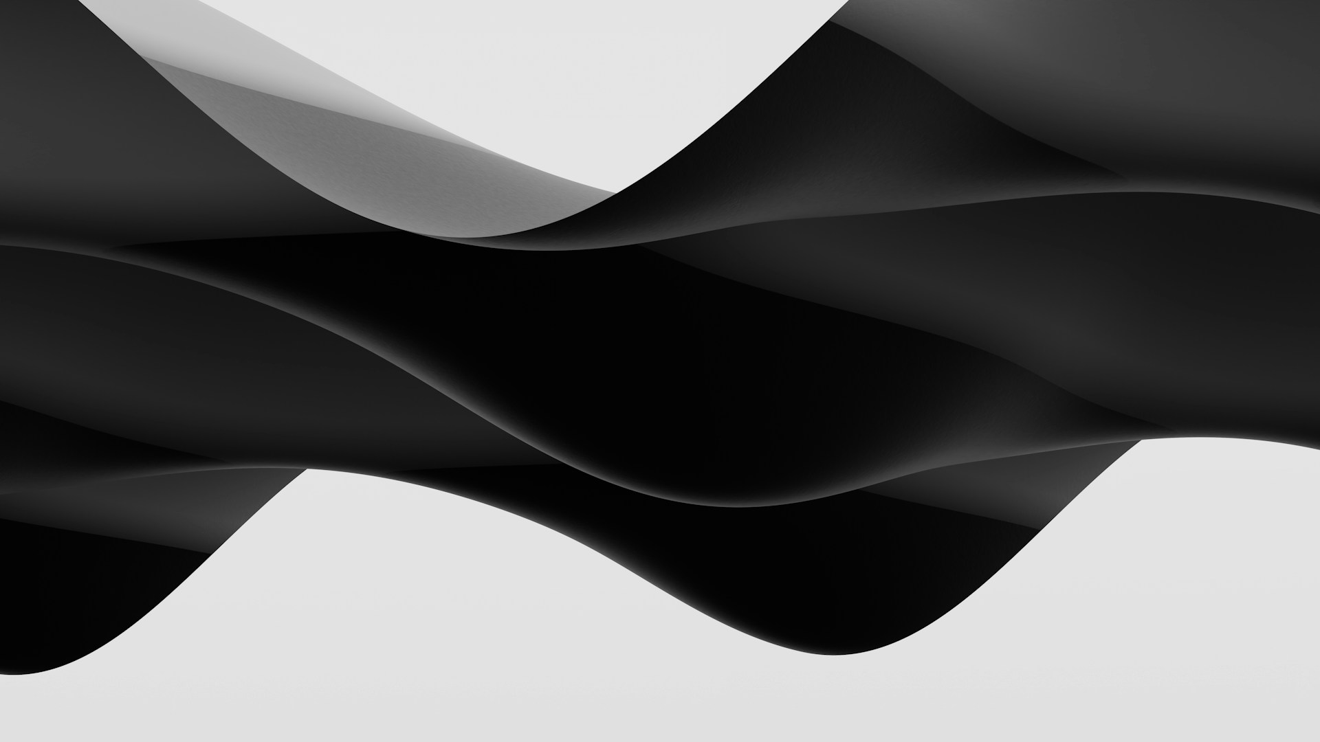 A black and white photo of a wave