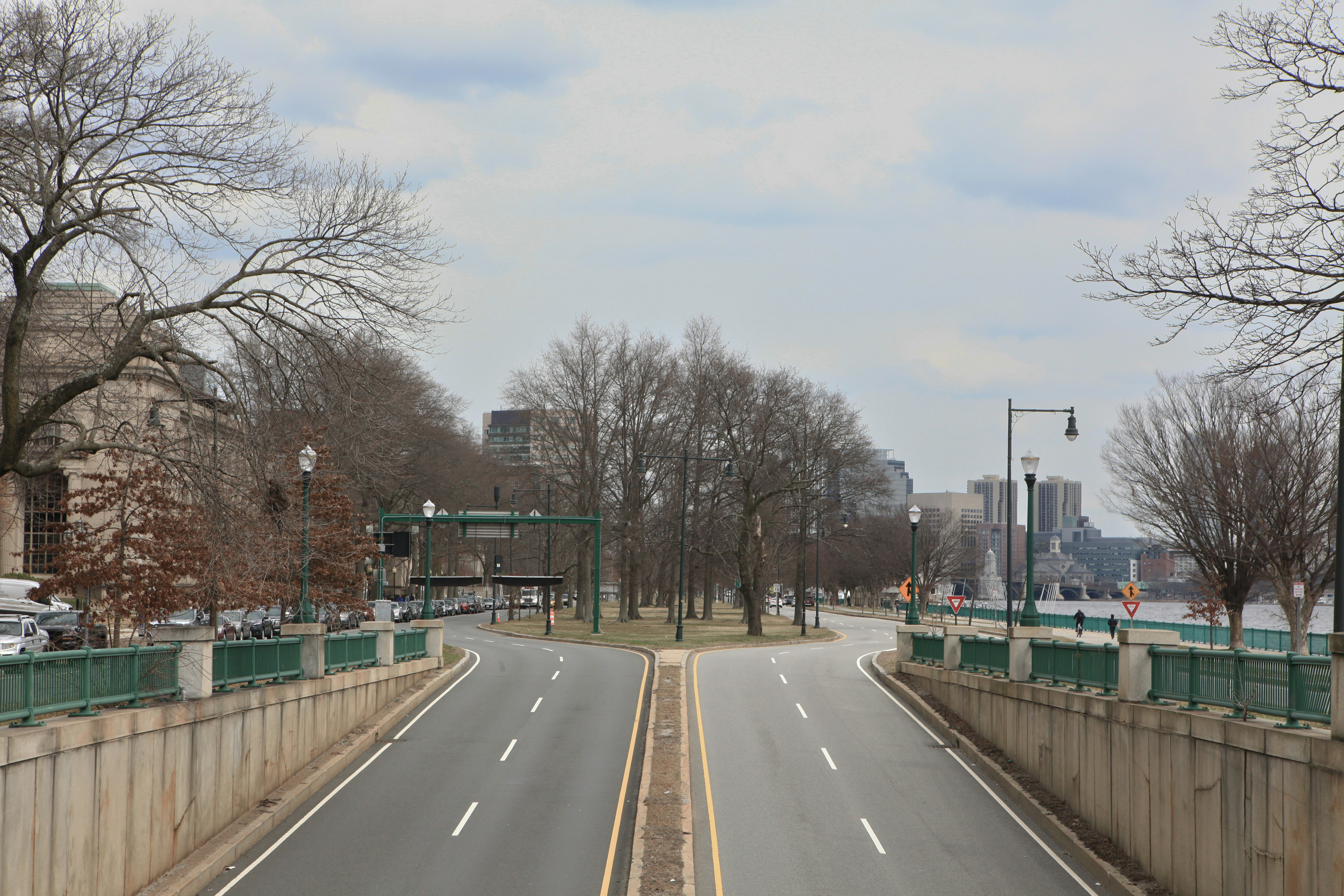 A view of an empty street from a bridge