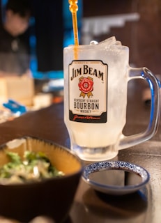 A drink being poured into a glass