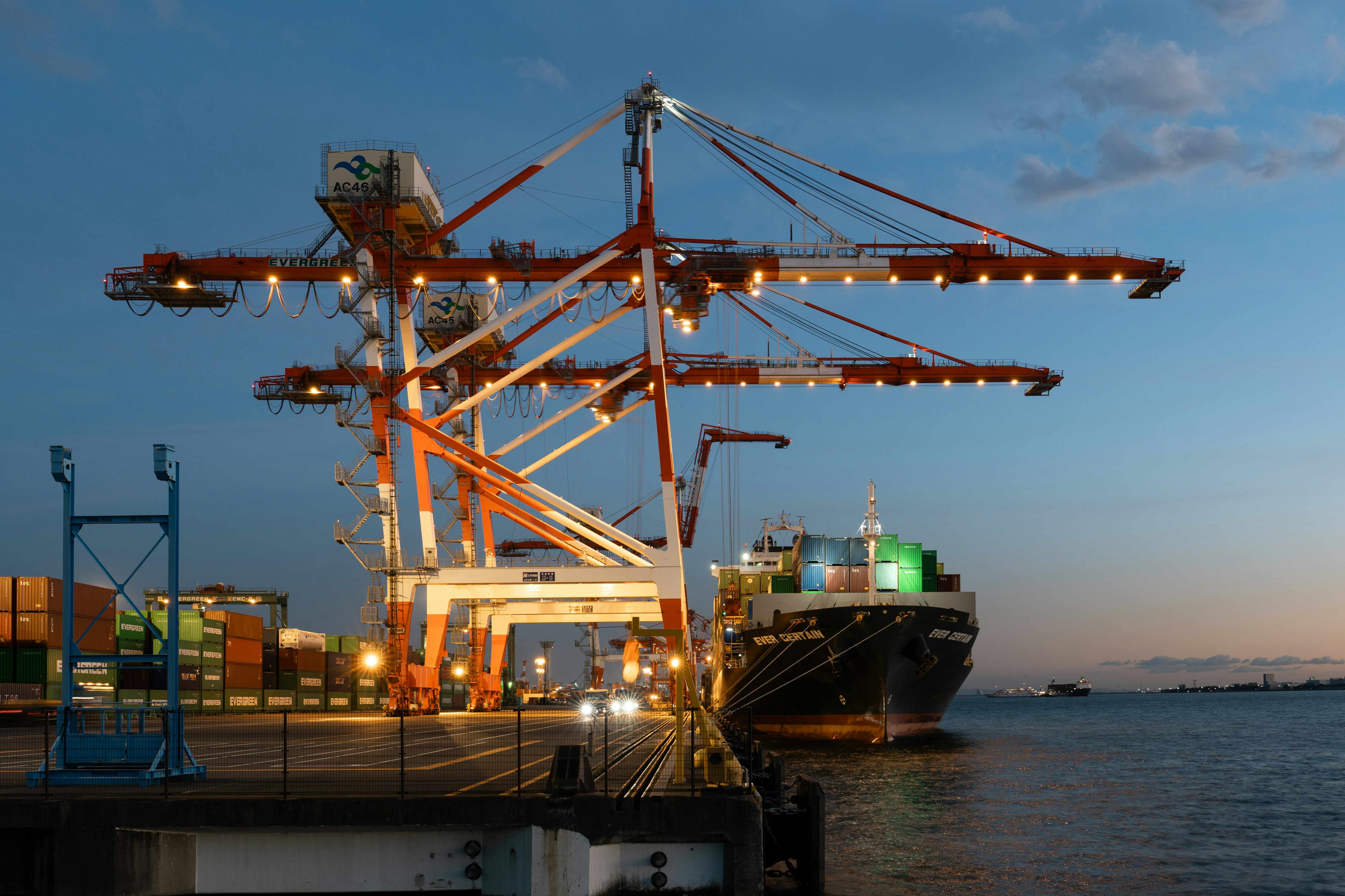 A large cargo ship docked at a dock