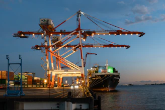 A large cargo ship docked at a dock