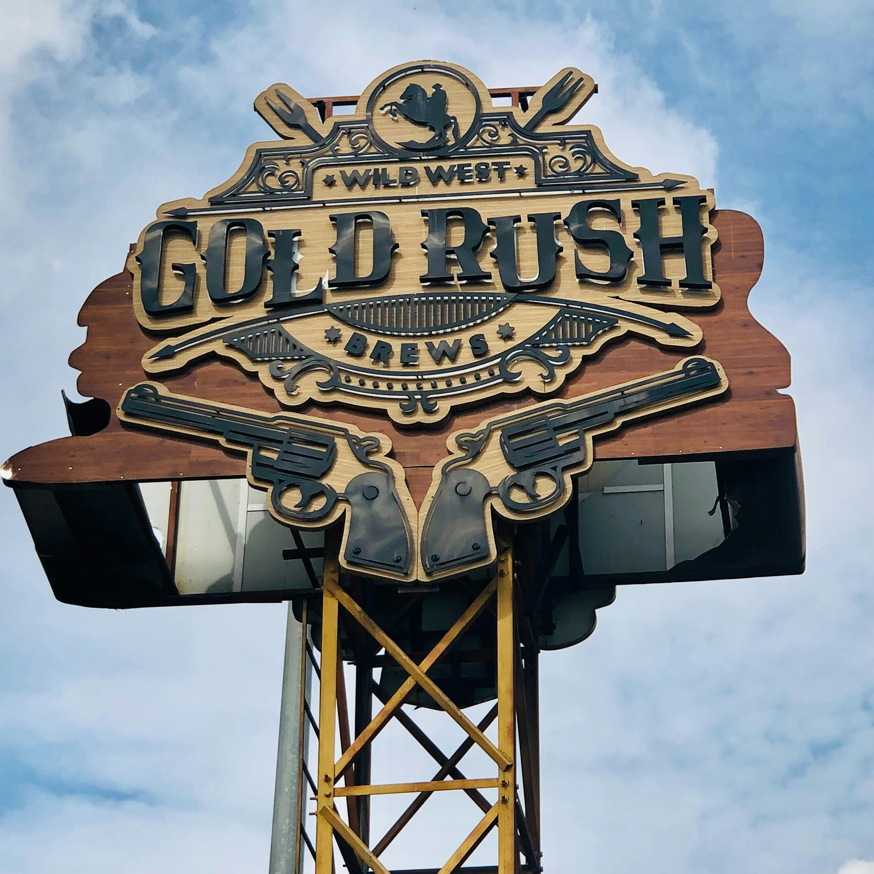 A sign that says gold rush on top of a building photo – Free Logo Image ...
