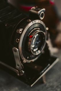 A close up of a camera on a table