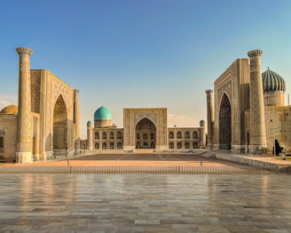 A large building with a blue dome on top of it