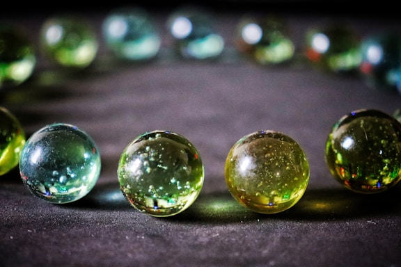 A group of glass balls sitting on top of a table