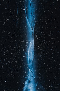 A large blue object floating in the air