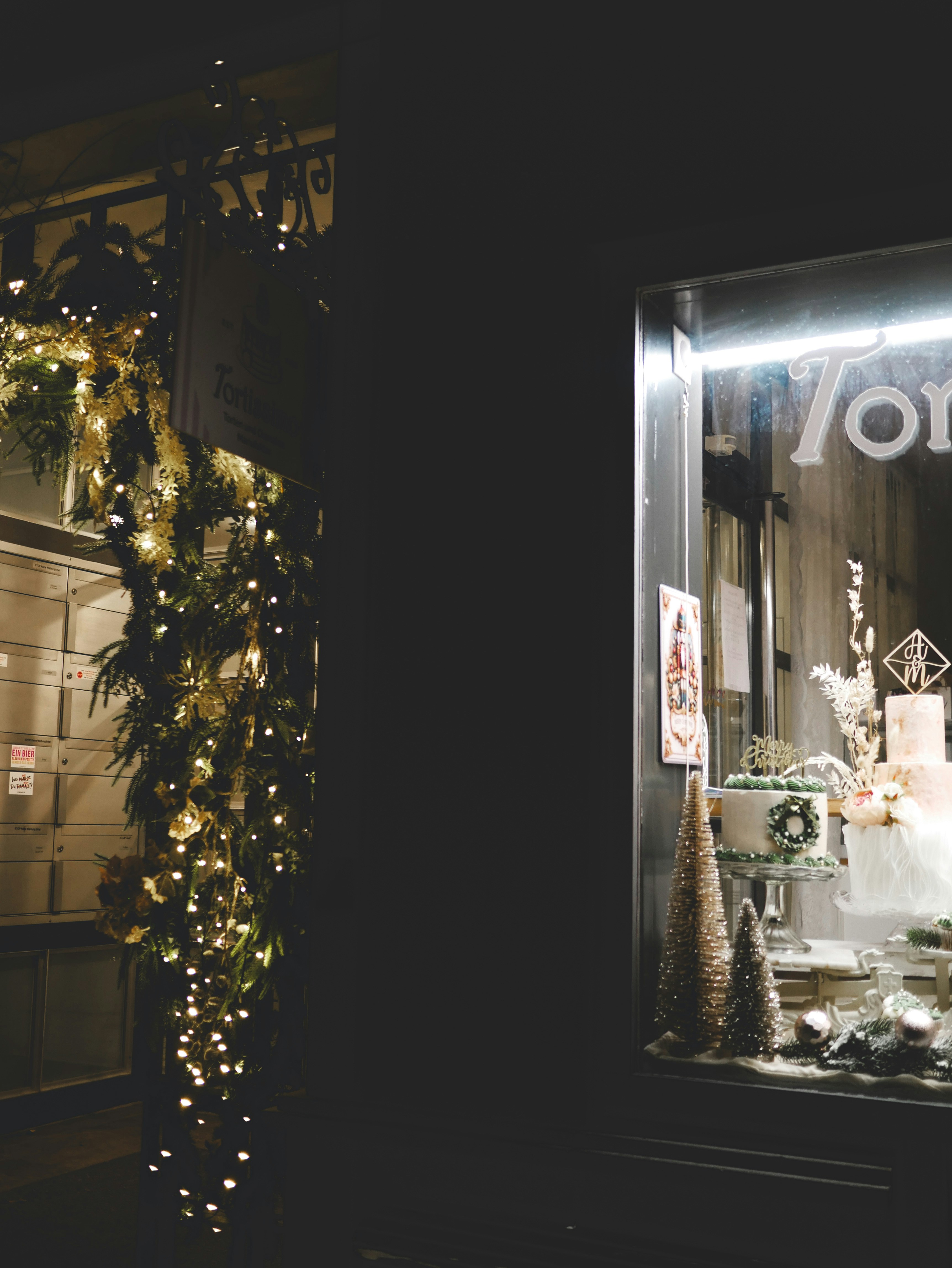 A store front with a christmas display in the window