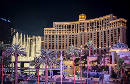 The las vegas hotel and casino is lit up at night