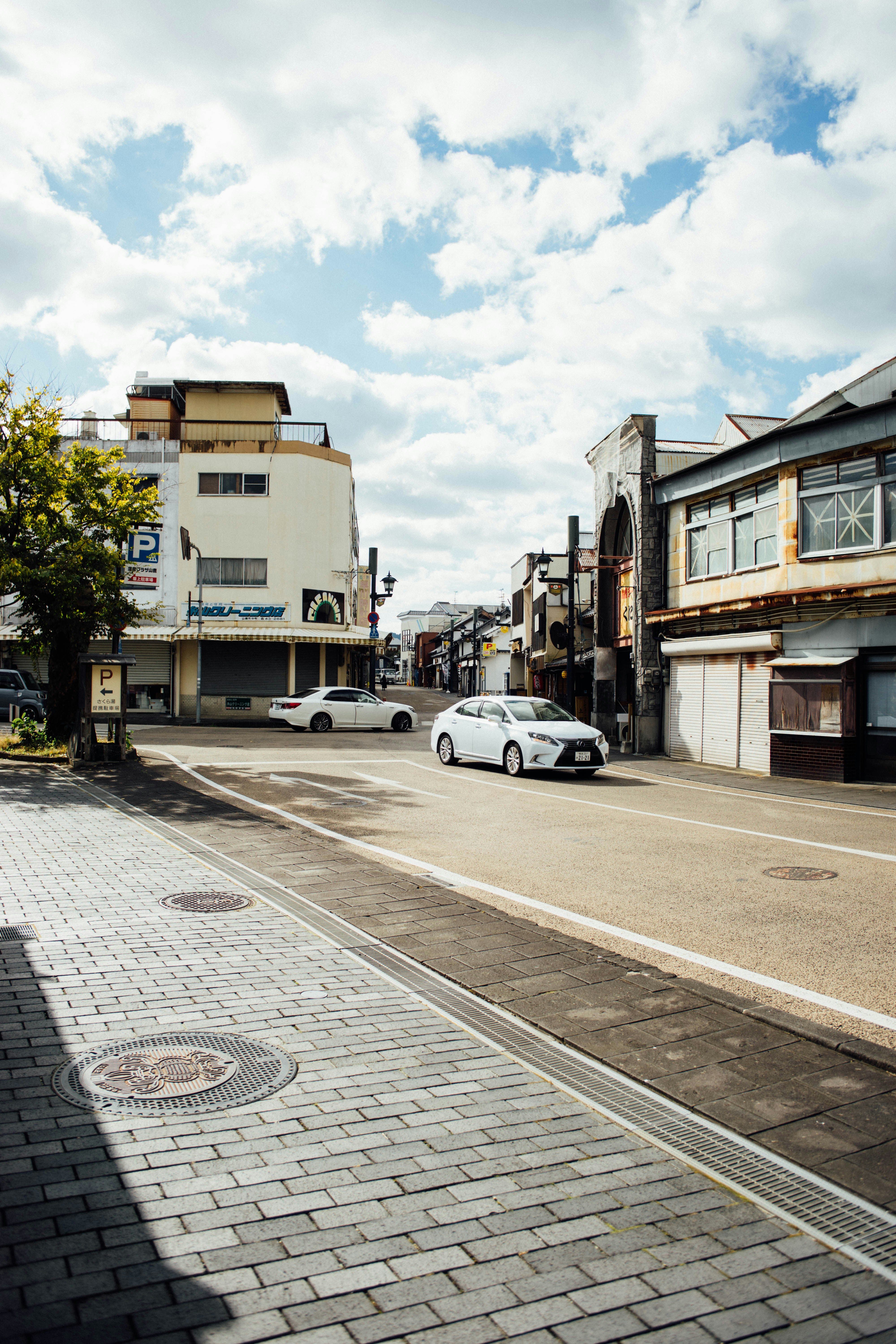 A car is parked on the side of the road