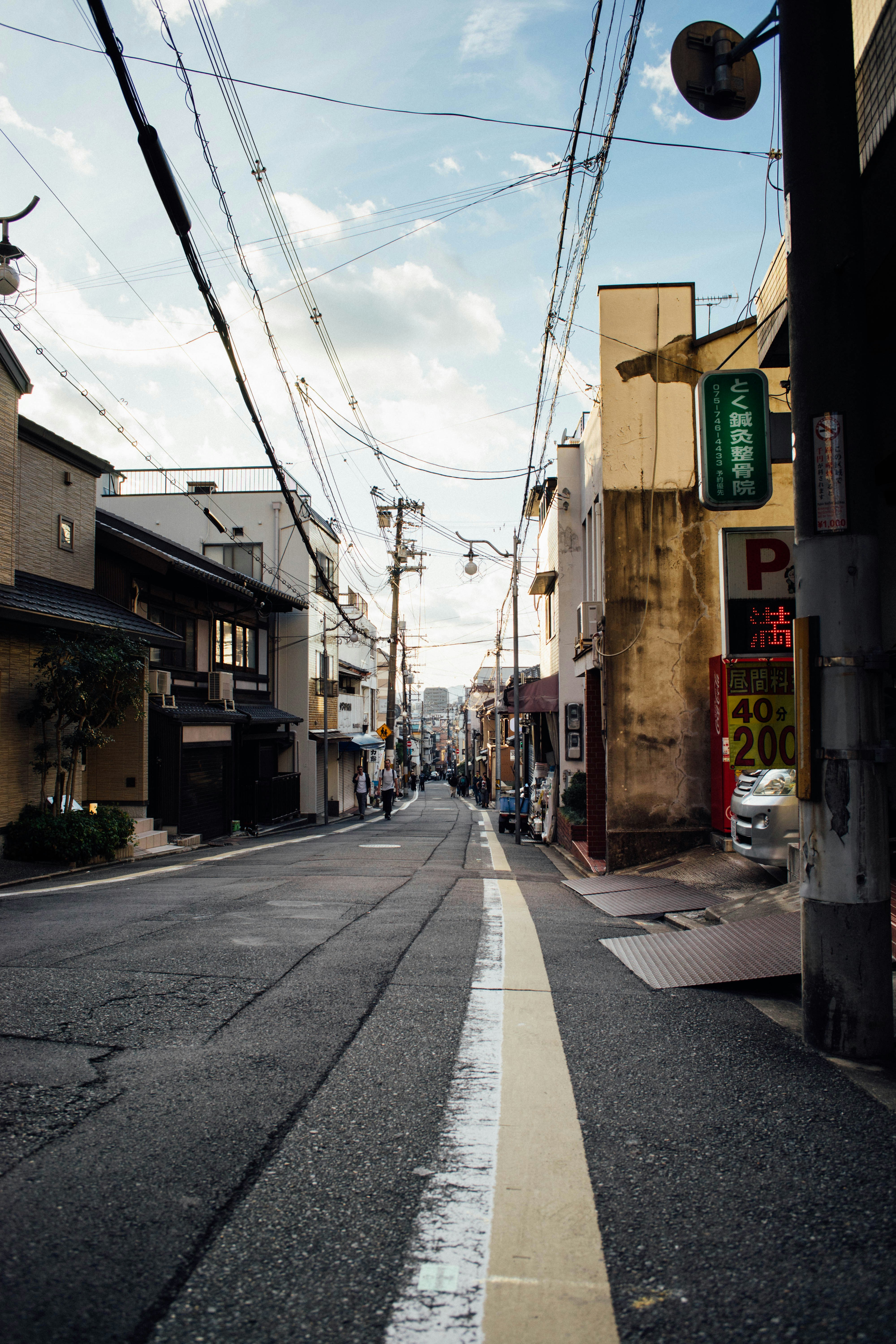 An empty street with buildings on both sides
