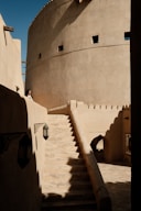 A building with a staircase going up to it