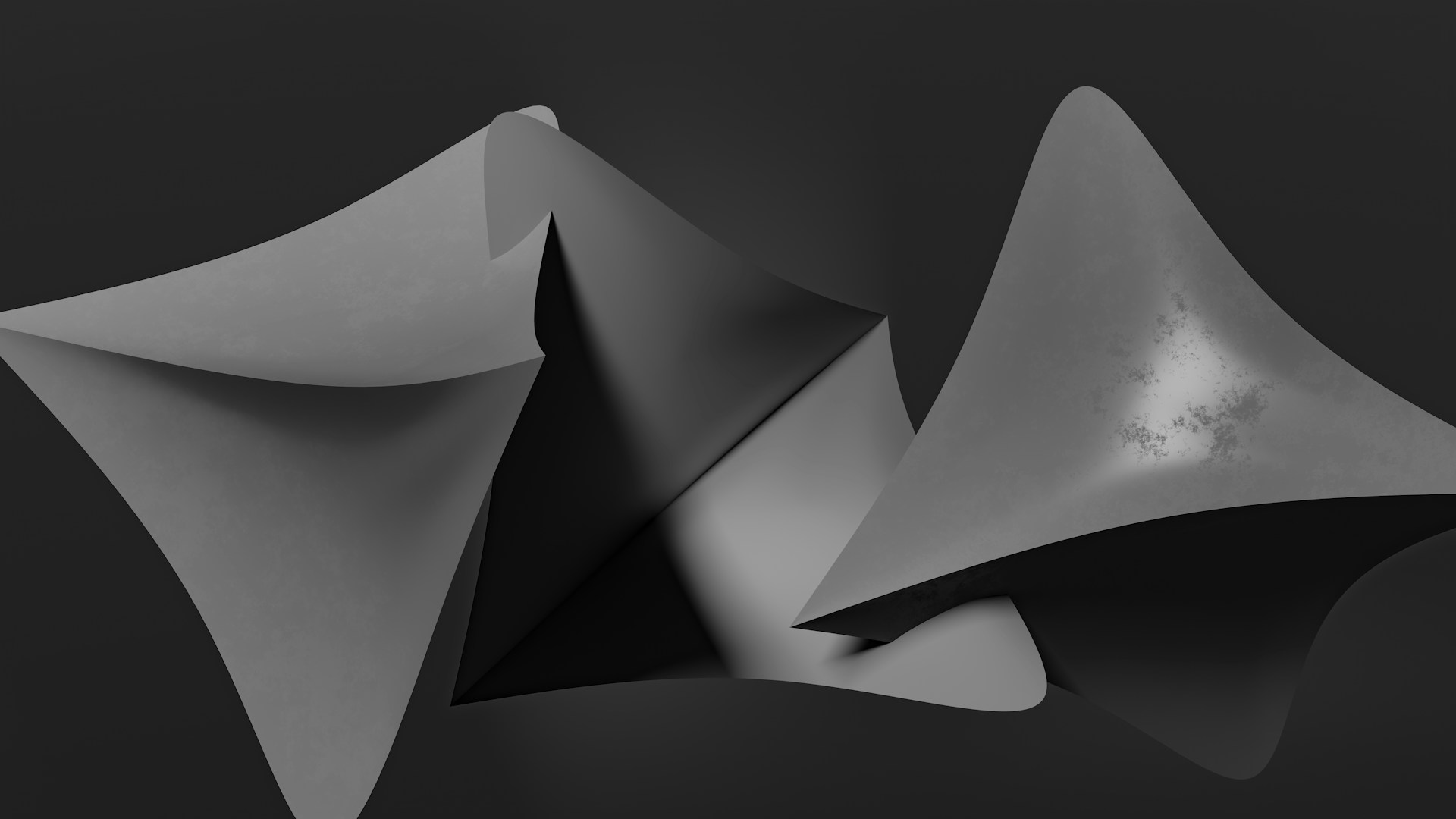 A black and white photo of two shapes
