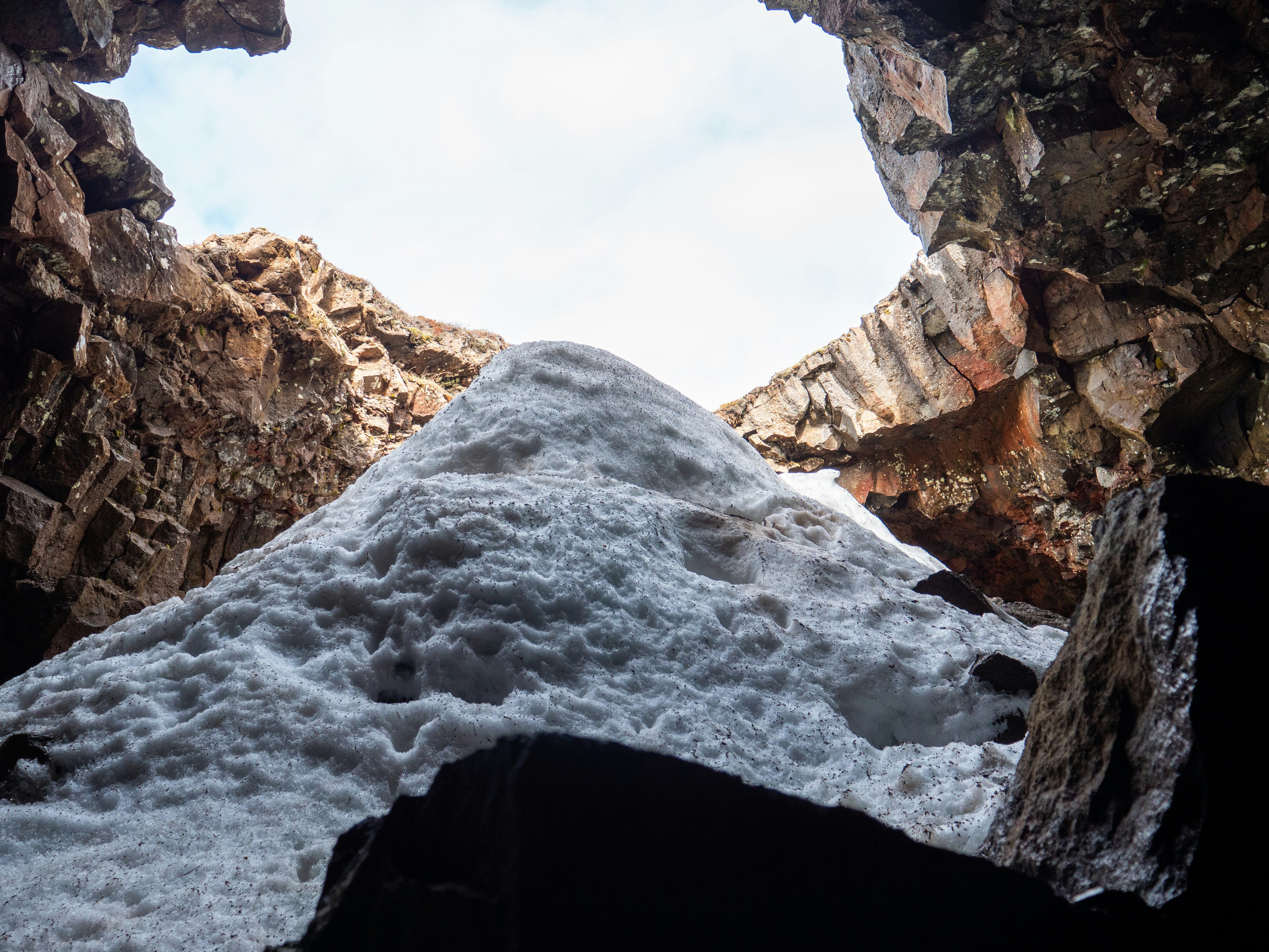 A view of the ocean from inside a cave