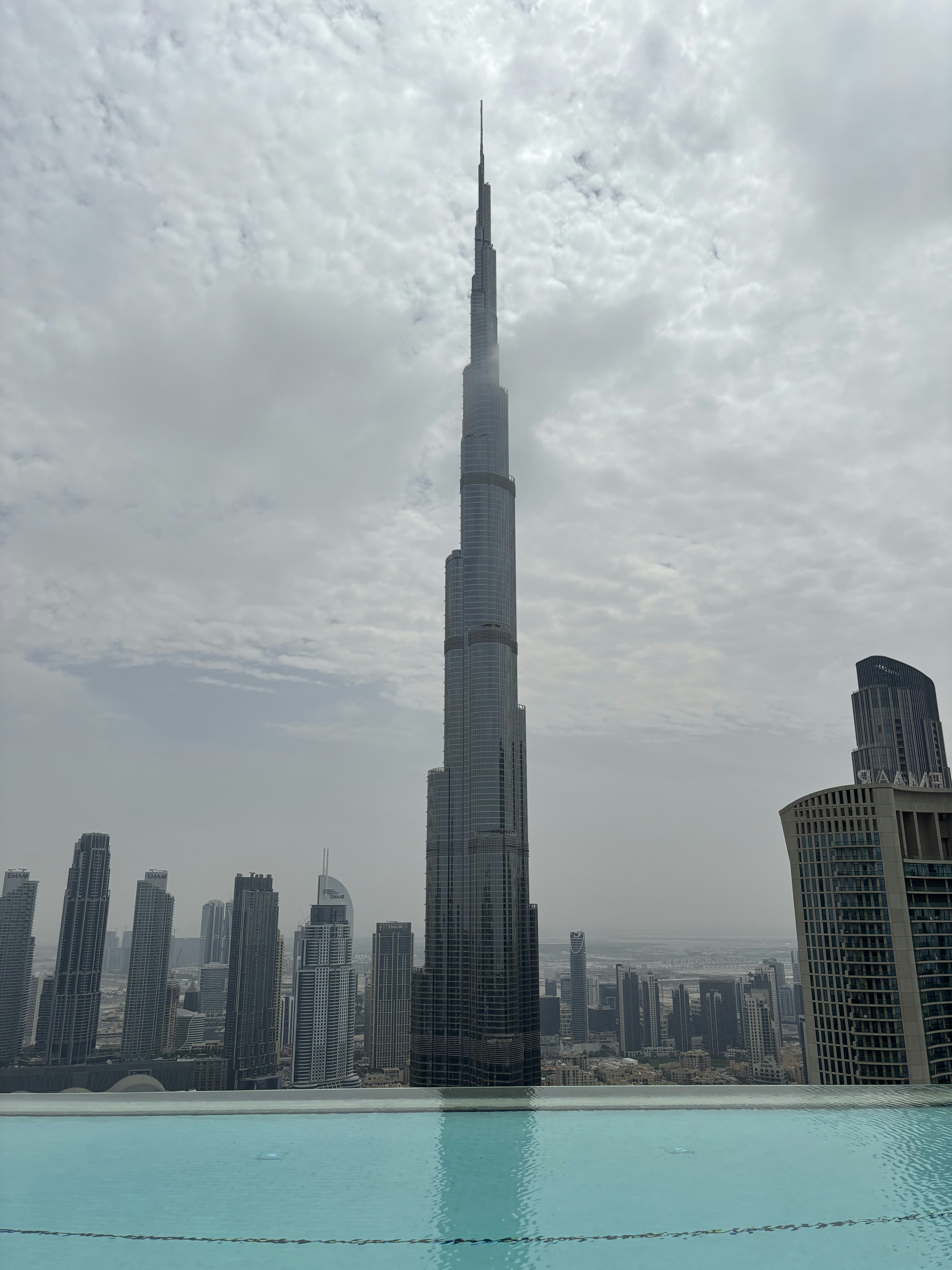 Panoramic view from Burj Khalifa observation deck overlooking Dubai cityscape