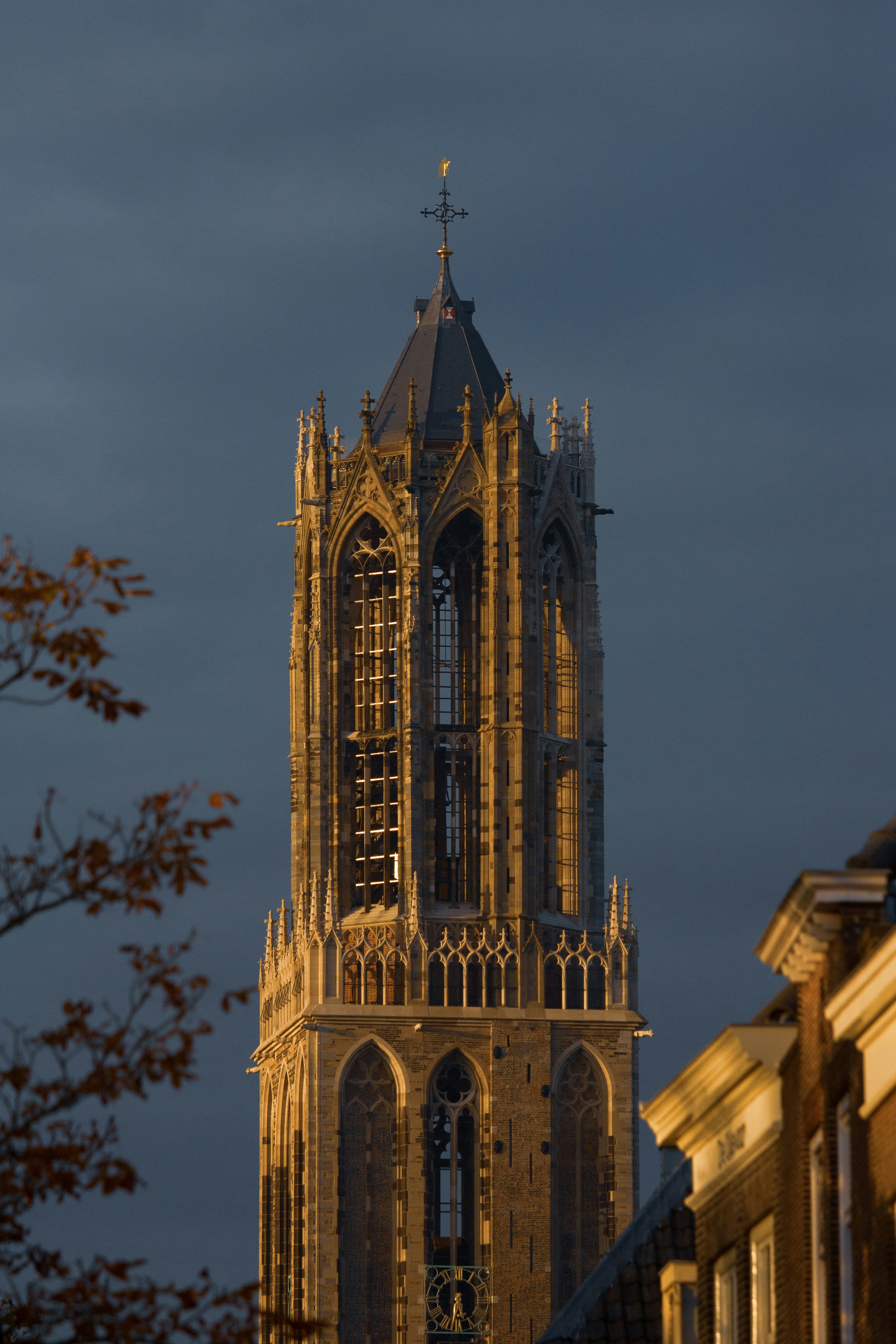A very tall building with a clock on it's side - Free Photo on Unsplash