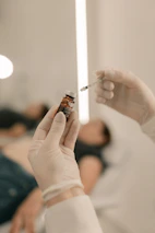 A person holding a cigarette in their hand