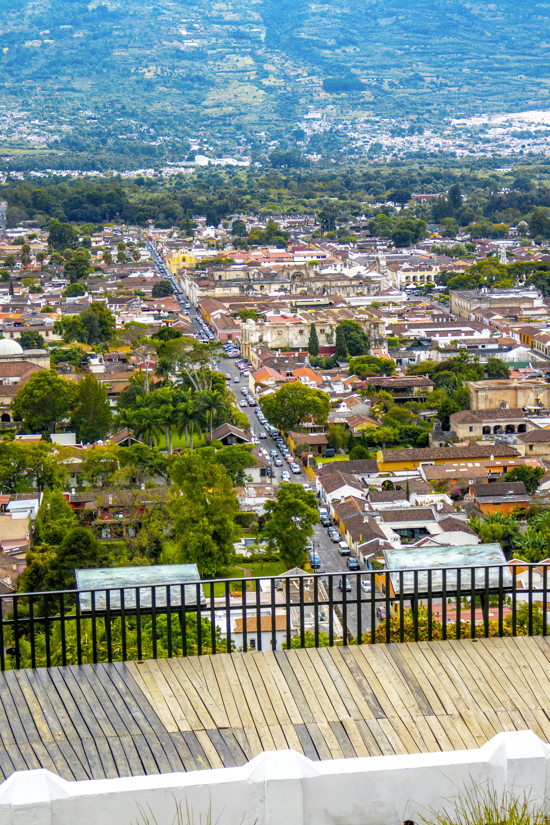 A view of a city from the top of a hill