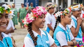 A group of young people standing next to each other