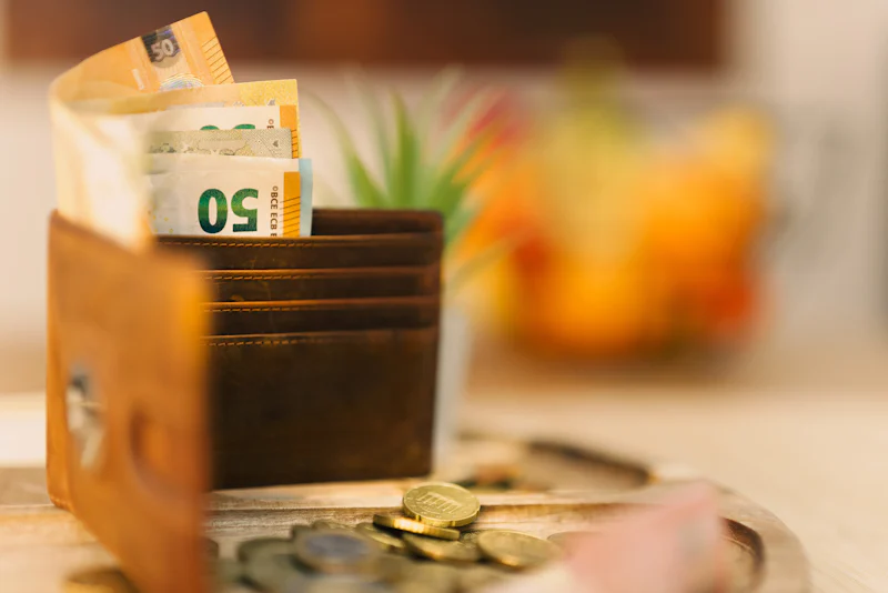 Wallet with cash representing a personal loan for immediate needs