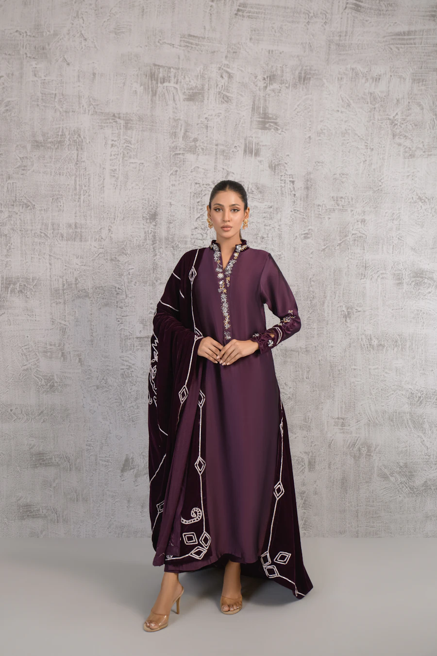 Elegant Pakistani fashion suit on display