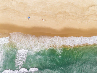 An aerial view of a beach and ocean