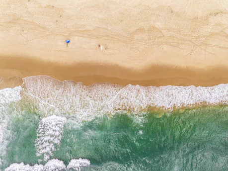 An aerial view of a beach and ocean