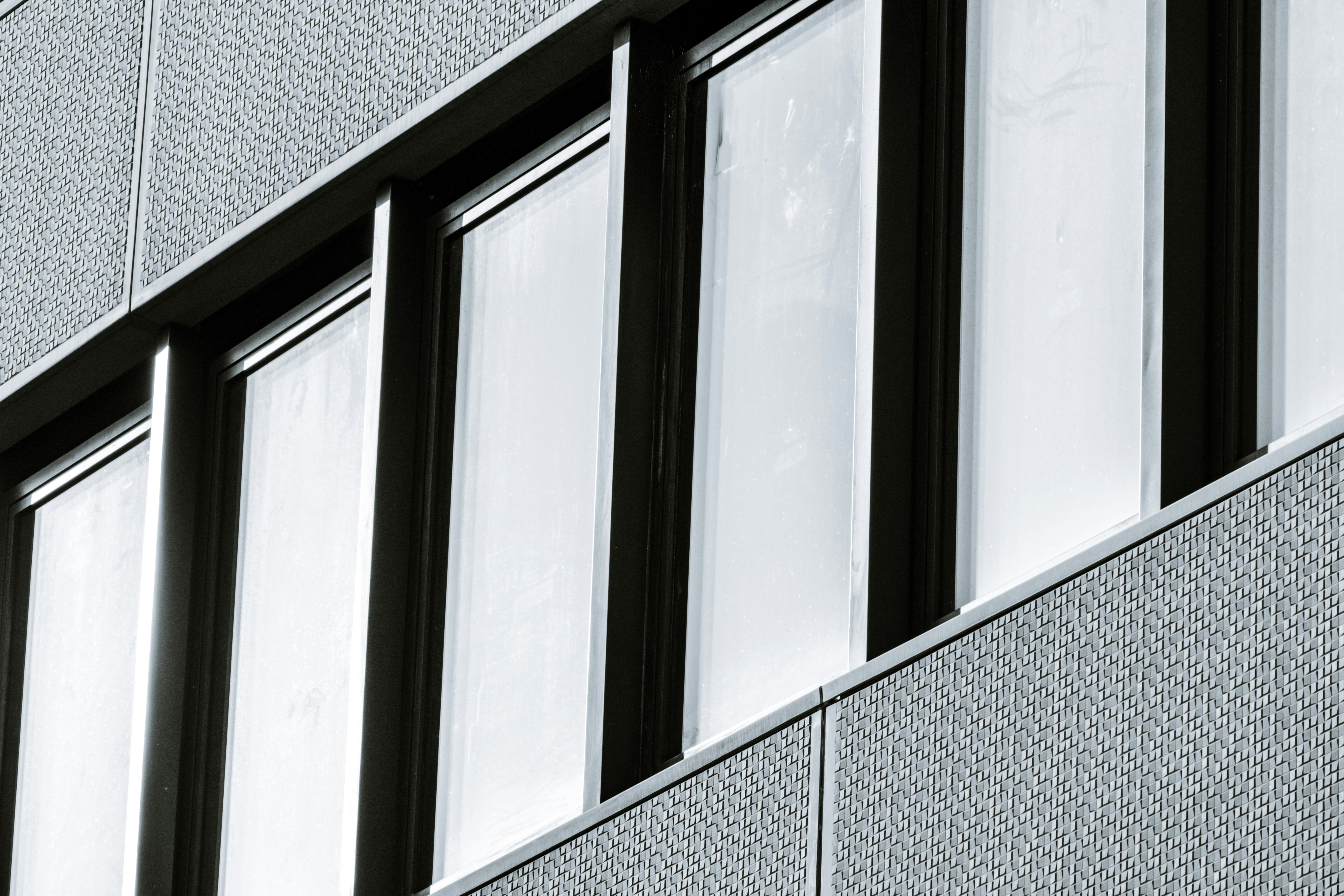A close up of the windows of a building