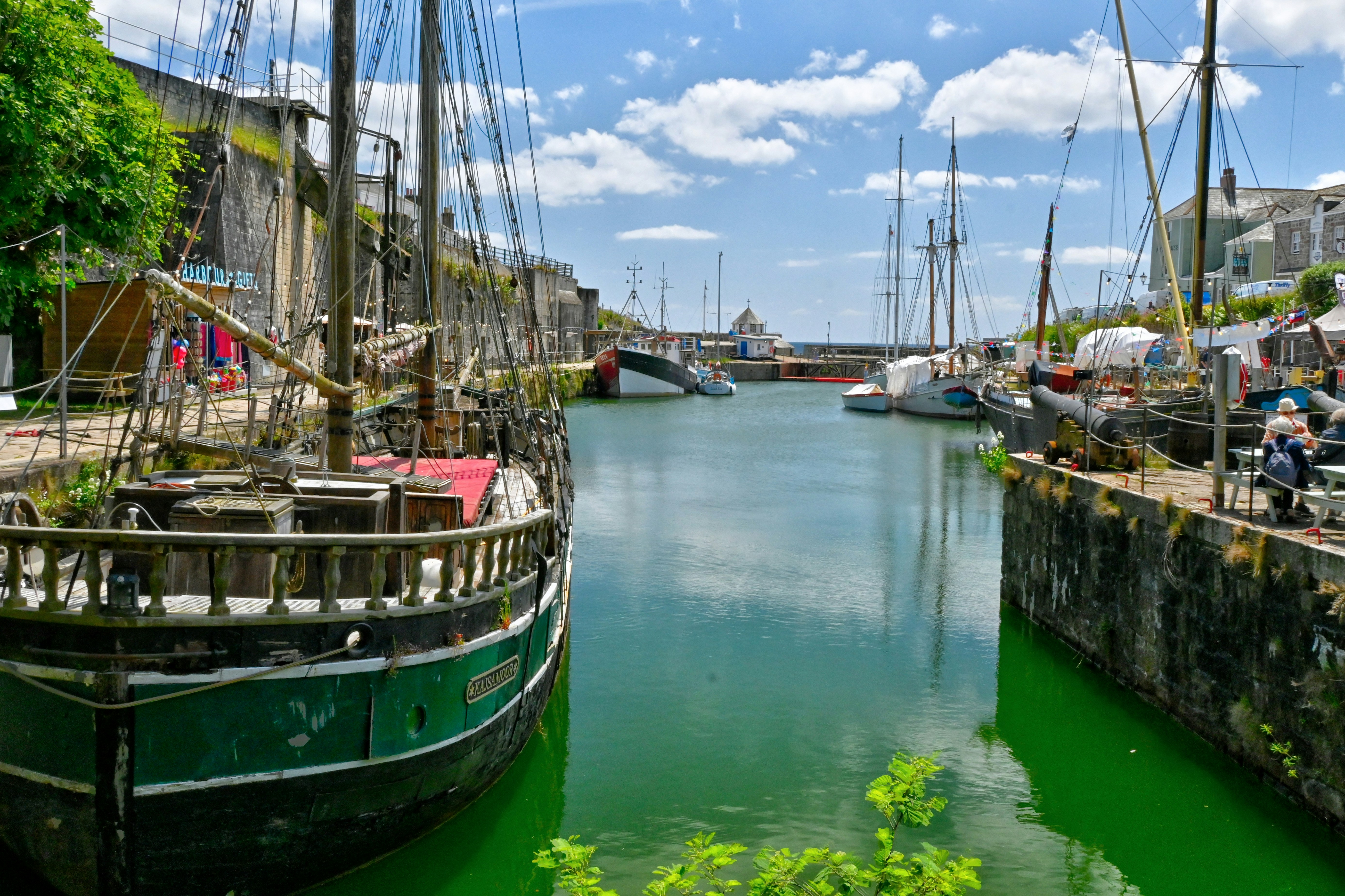 A body of water that has a bunch of boats in it