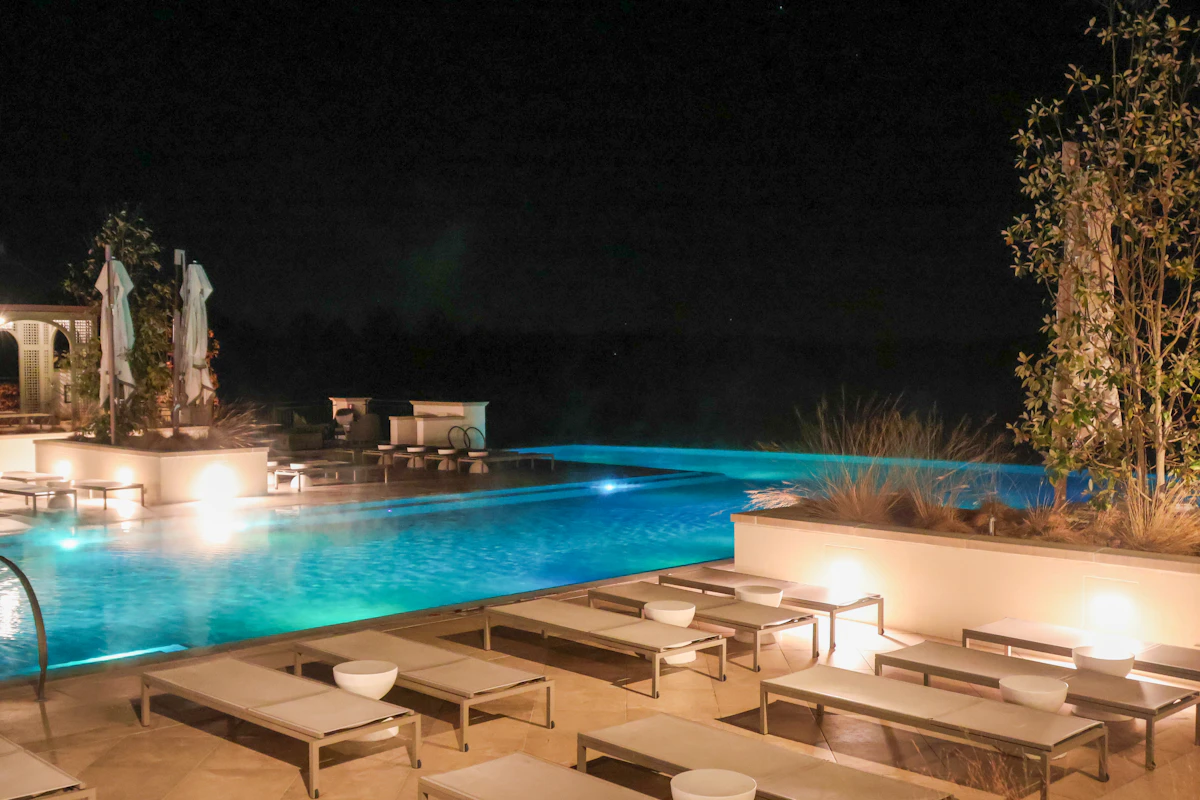 Infinity pool lit at night