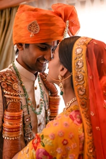 A man and woman dressed in traditional indian garb