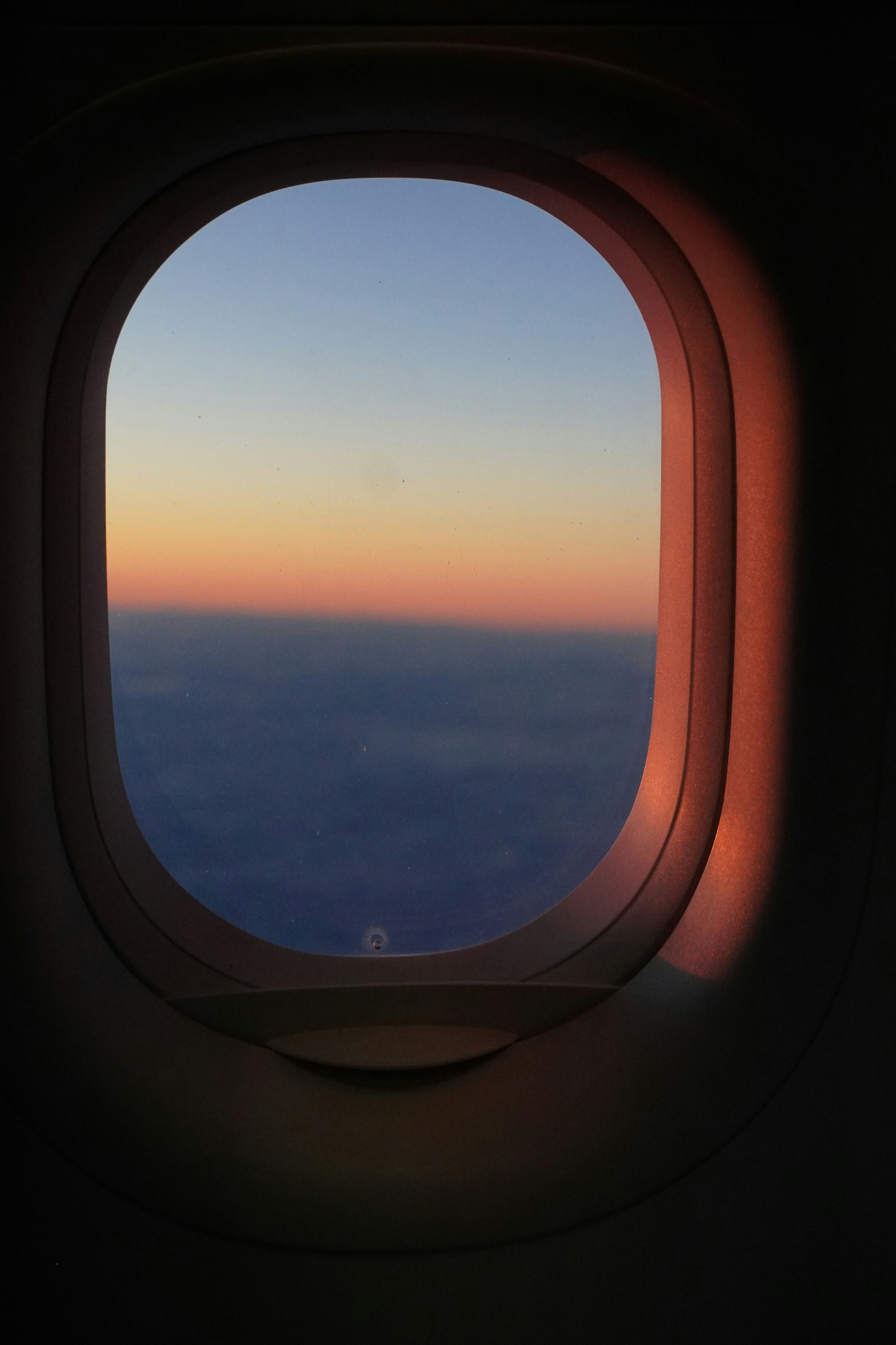 A view of the sky through an airplane window