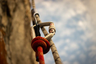A close up of a rope with a sky in the background
