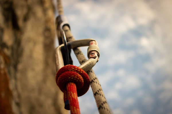 A close up of a rope with a sky in the background