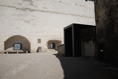 A building with a door and a window on the side of it