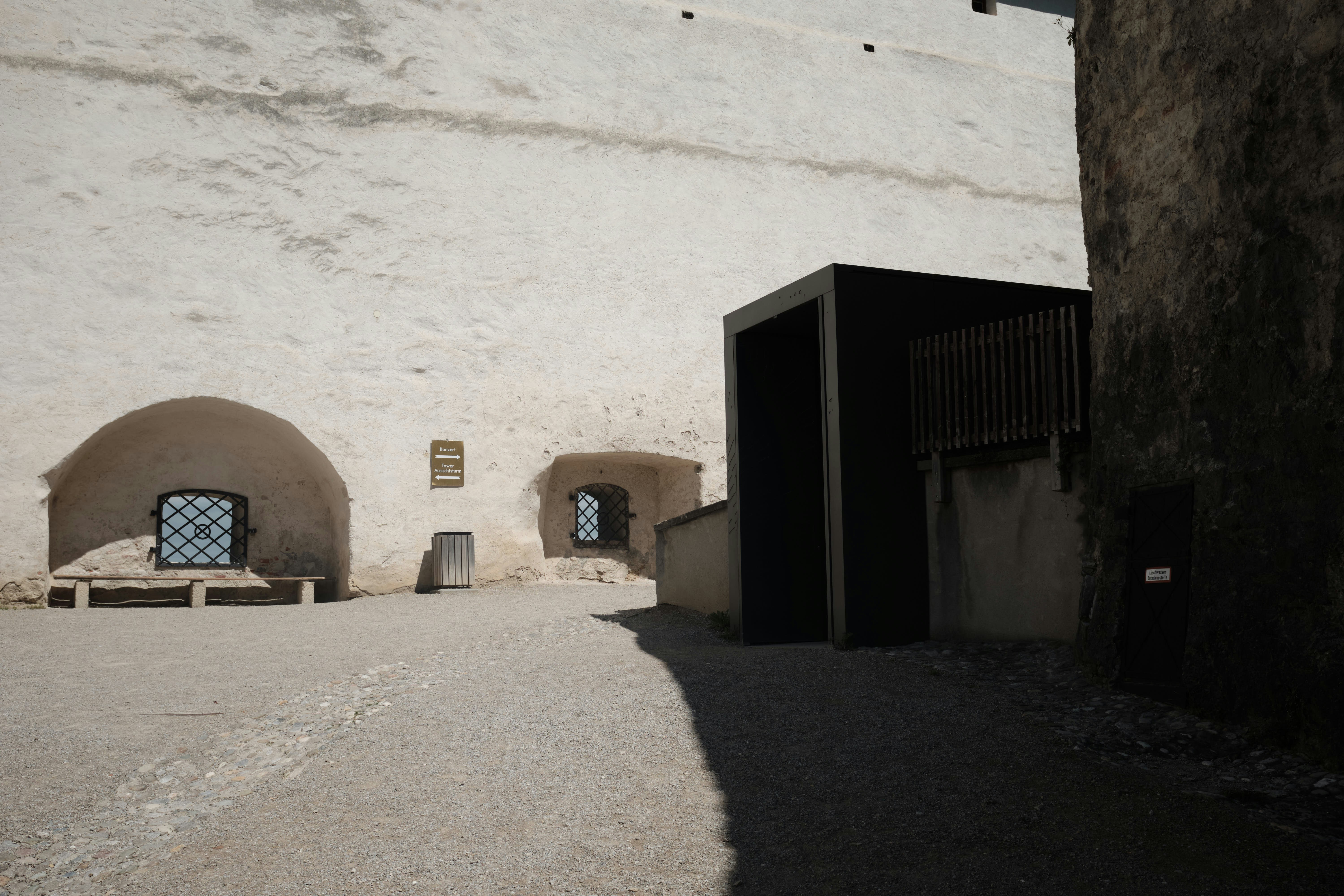 A building with a door and a window on the side of it