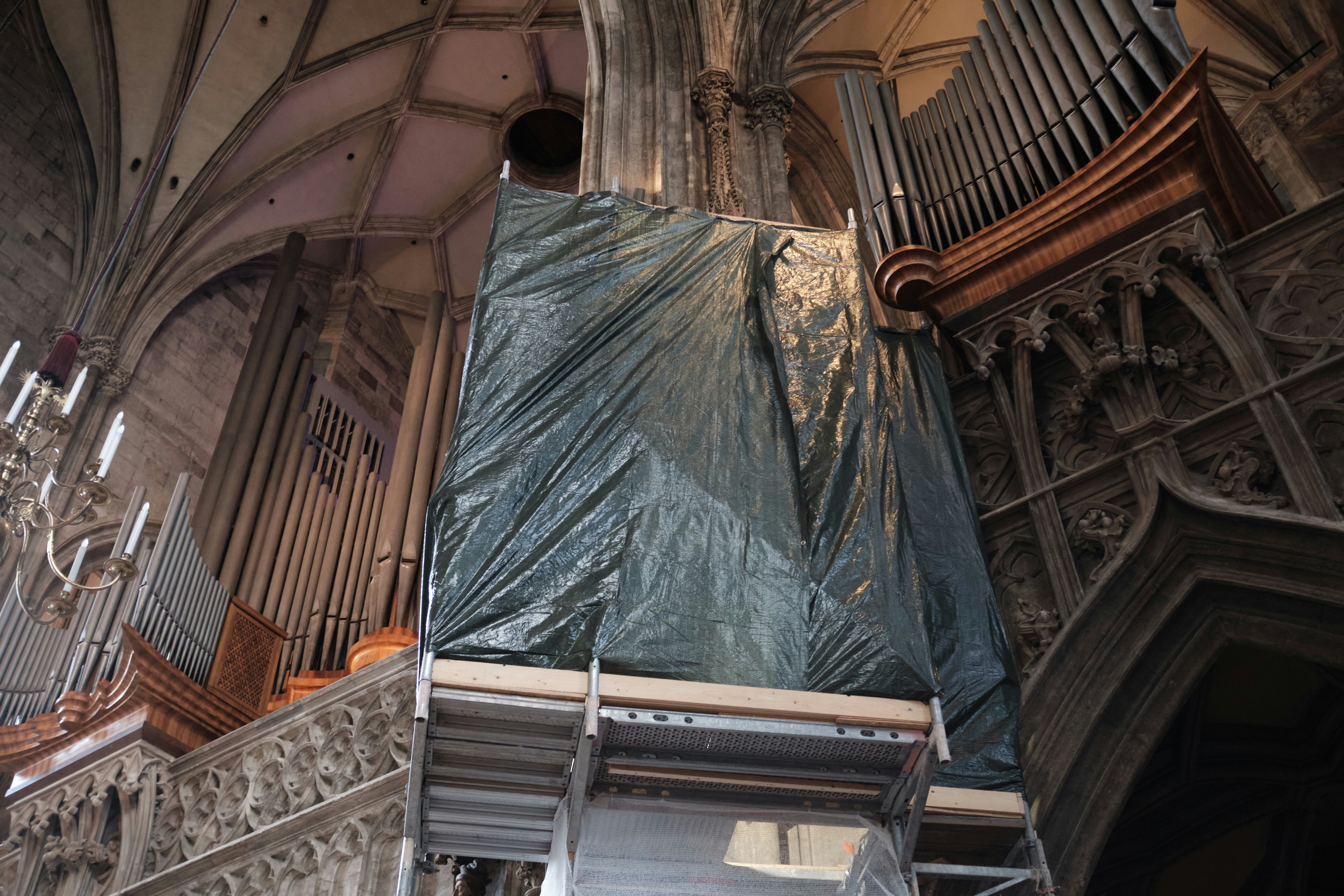 A cathedral with a pipe and organ in it