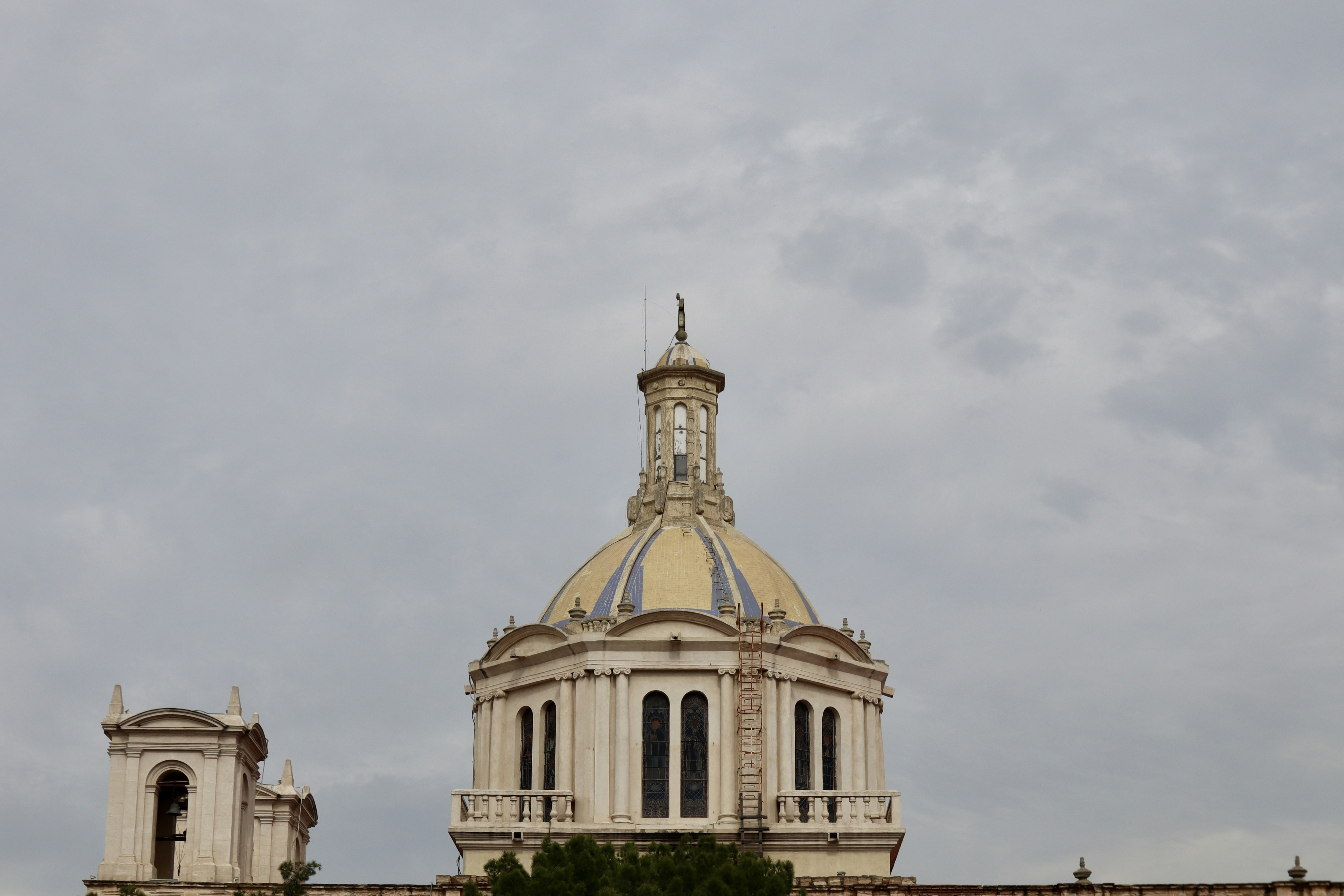 A large building with a clock on the top of it