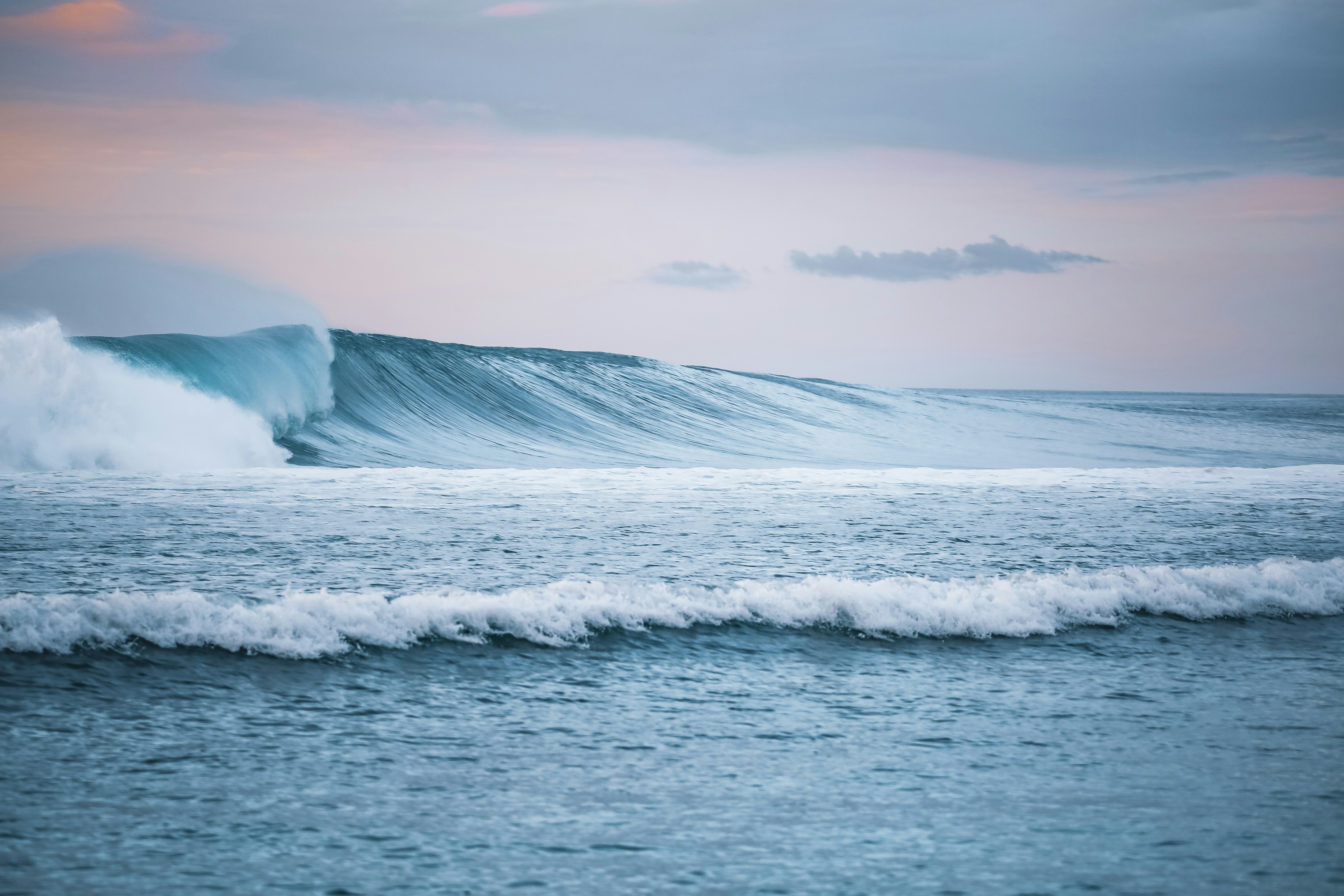 A large wave in the middle of the ocean