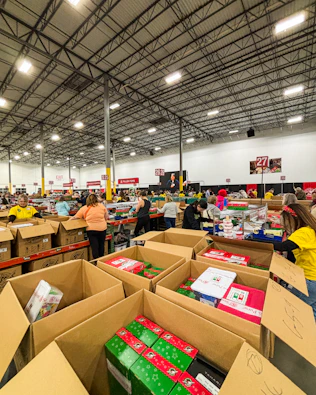 A large warehouse filled with lots of boxes