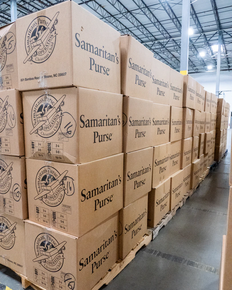 A large stack of boxes in a warehouse