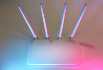 A group of sticks sticking out of a white square