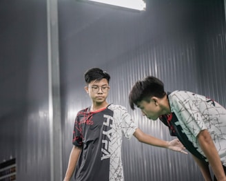 A couple of men standing next to each other