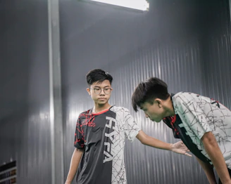 A couple of men standing next to each other