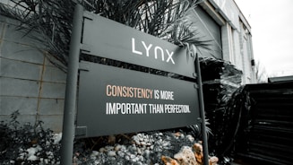 A sign that is in front of a building