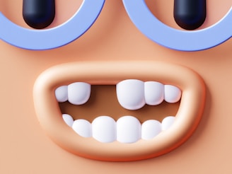 A close up of a fake tooth with glasses on it