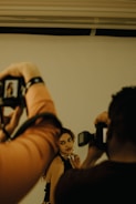 A woman taking a picture of herself in a mirror