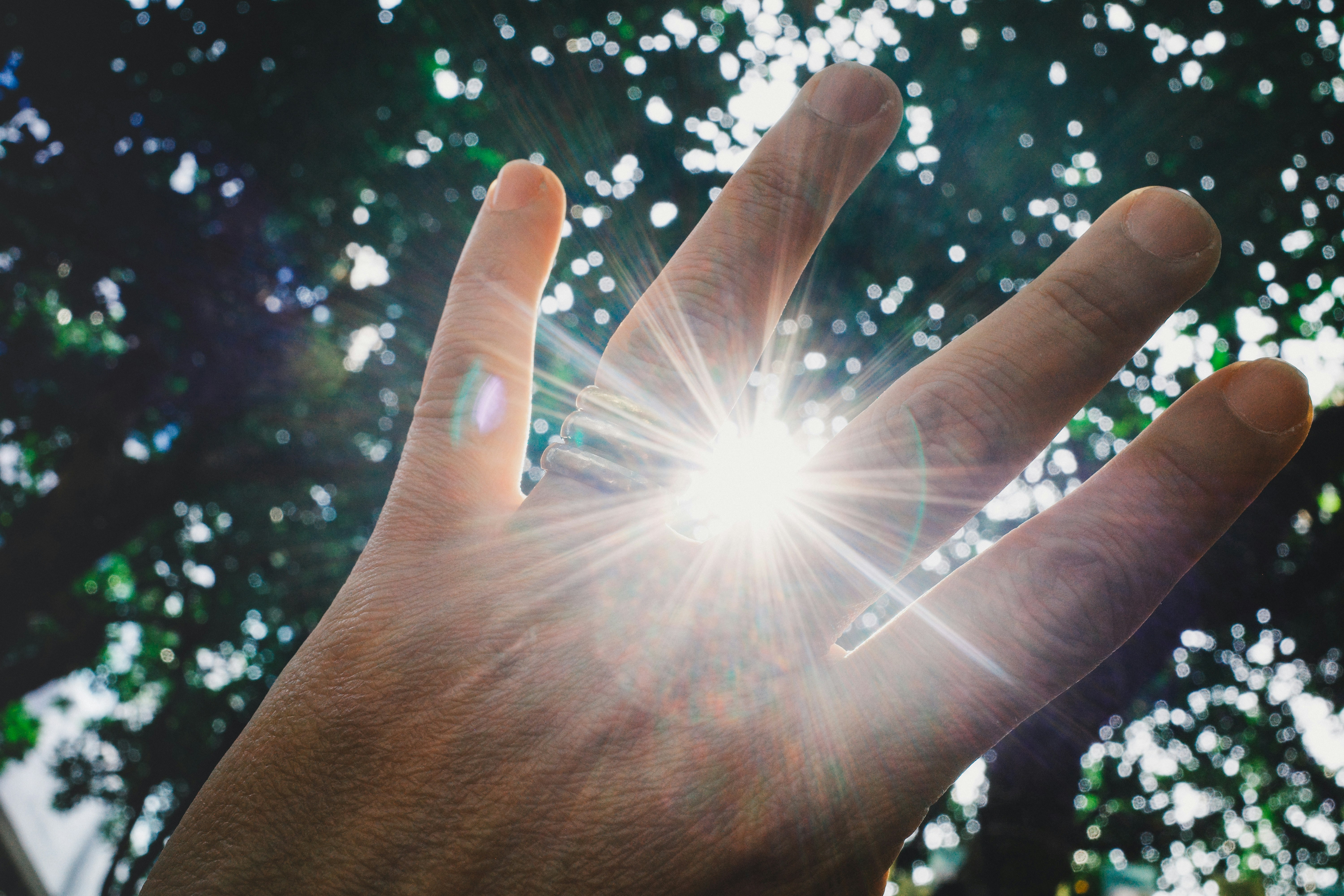 A person's hand interacting with a futuristic holographic data screen, illustrating the advanced, AI-powered marketing automation systems of 2026.
